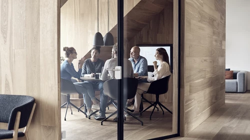 Business executives discussing in office meeting